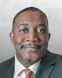 girl reading roberto clemente book